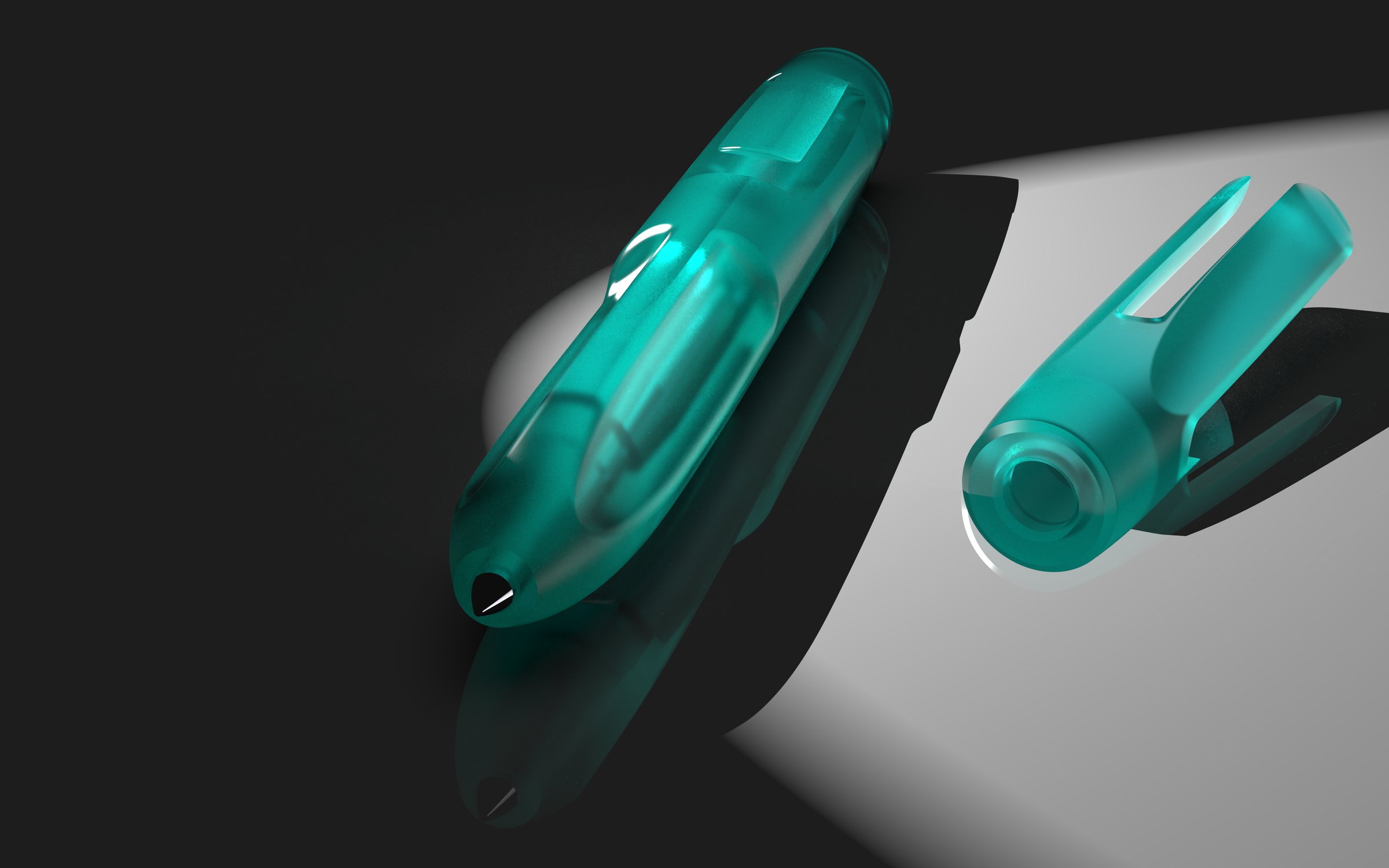 The pen and its cap lying apart, light shining through the resin